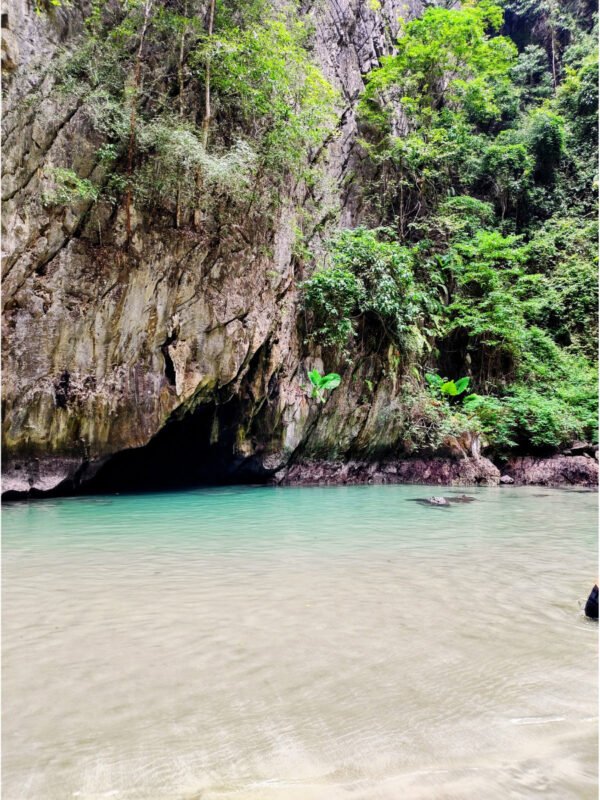 Exit from the Emerald Cave, pool and beach inside Emerald Lagoon