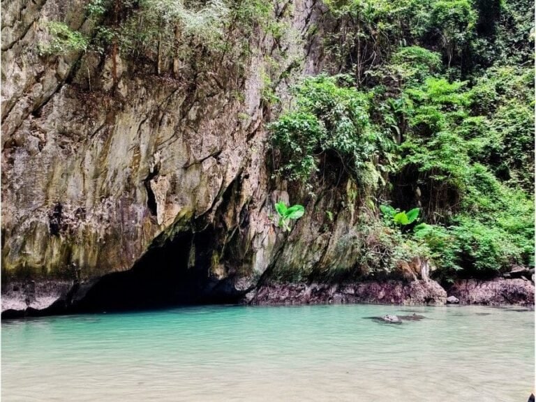 Exit from the Emerald Cave, pool and beach inside Emerald Lagoon