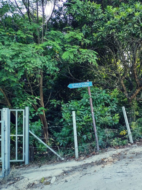 Forest, village path and signpost to Sunset beach on Koh Lipe