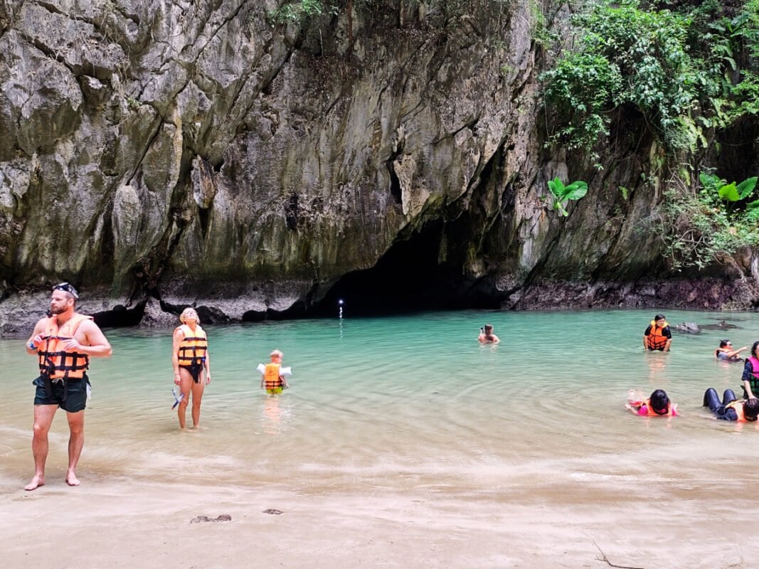 People inside emerald cave on a day trip to koh mook.