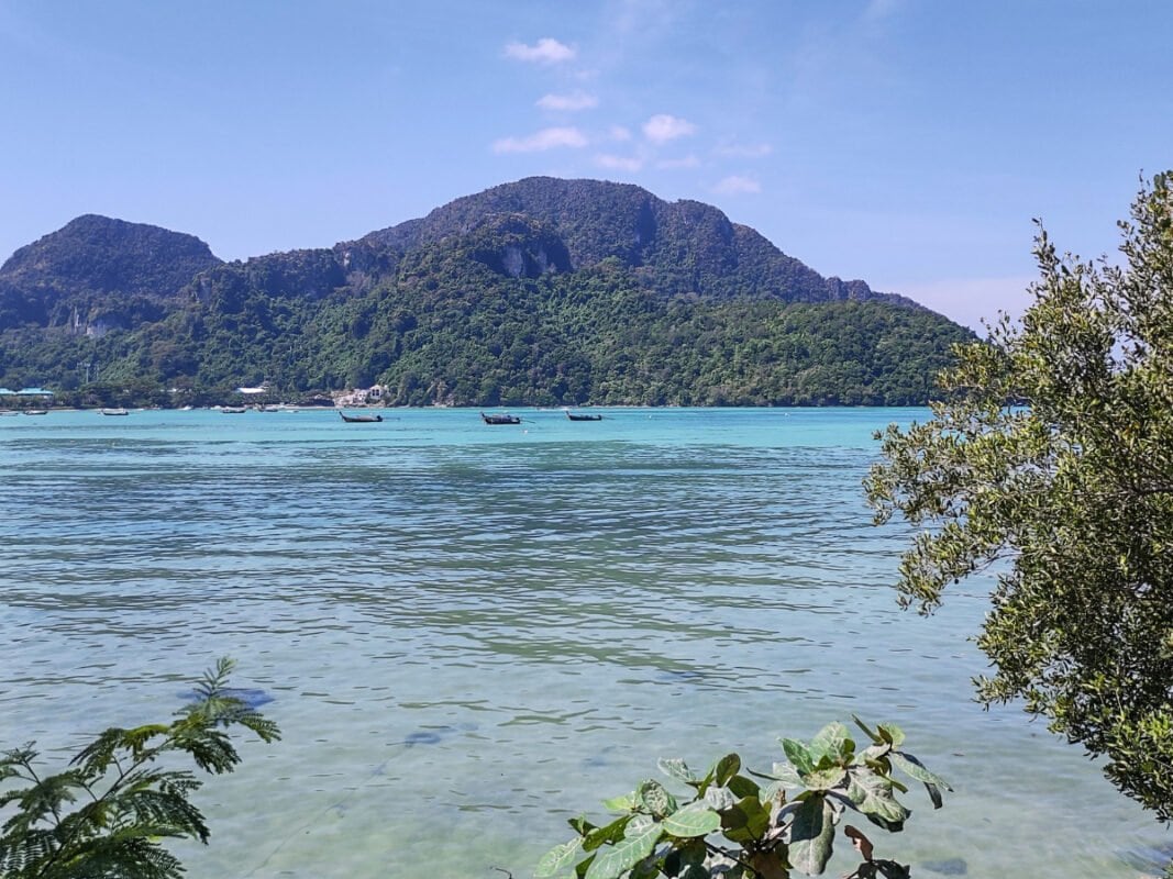 Koh Phi Phi view of the bay, blue water, mountains covered with jungle