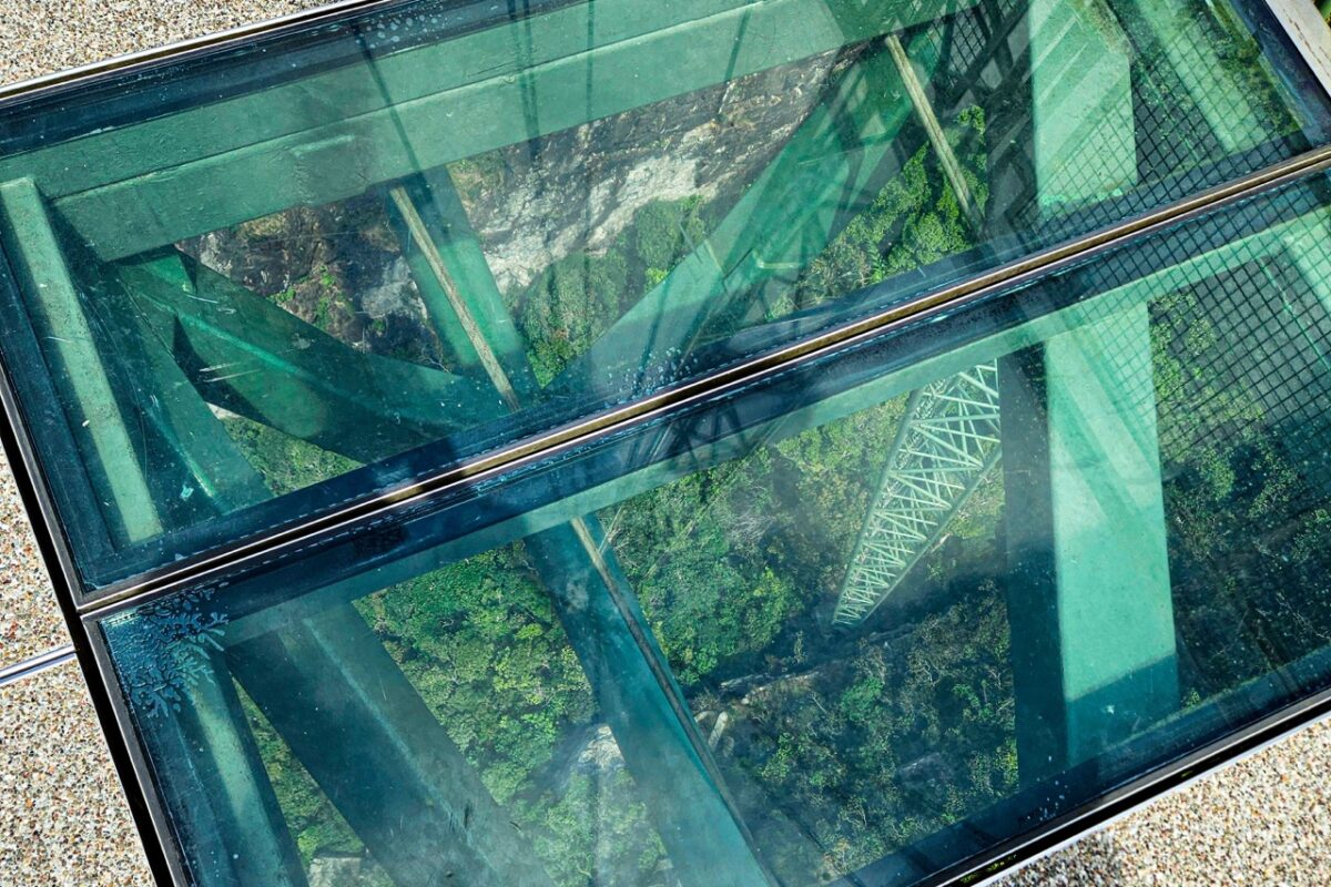 Glass floor on Skybridge Langkawi, view of the jungle and mountains below