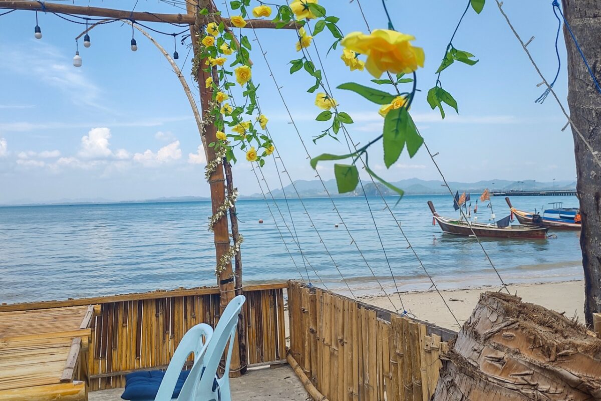 View from beach café on Koh Mook with longtail boats and sea