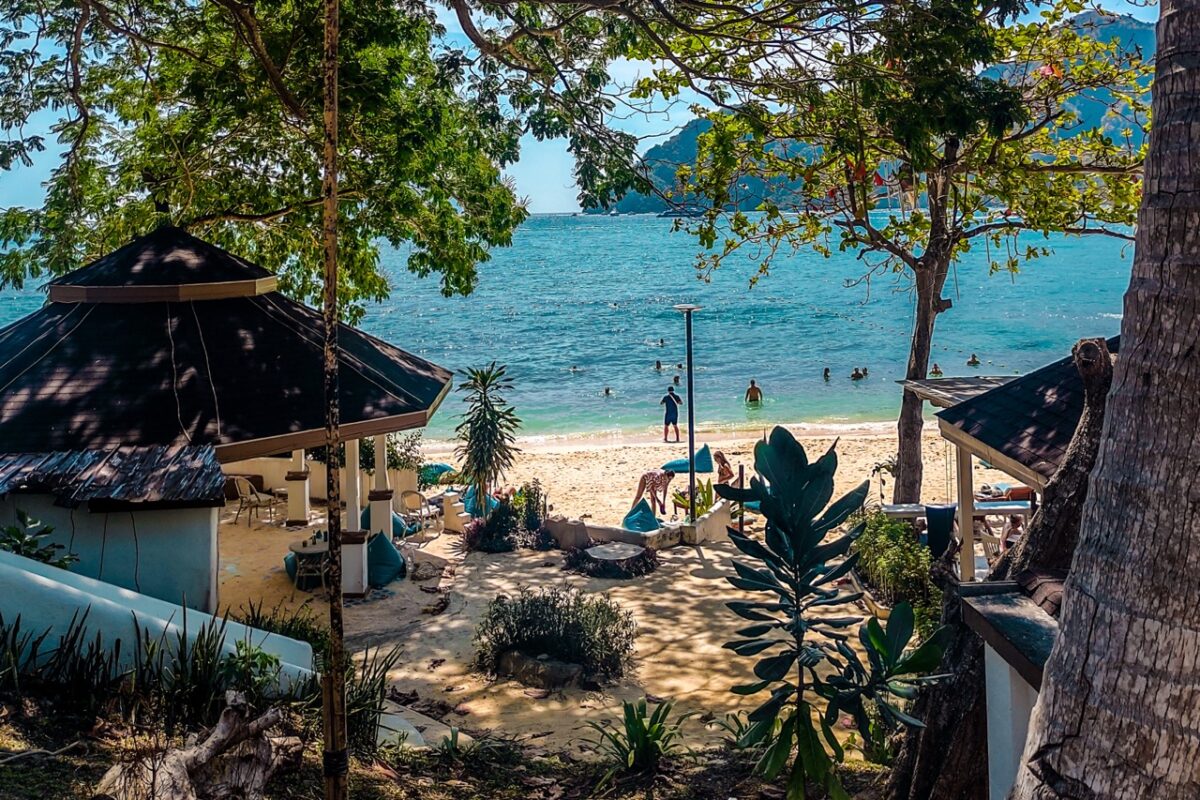 Laem Hin Beach Koh Phi Phi shaded trees beach calm water near Tonsai