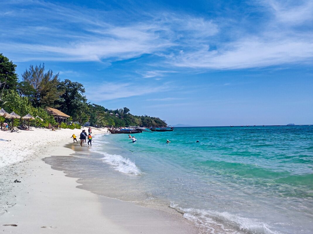 Long Beach Koh Phi Phi Thailand clear water white sand boats and swimmers