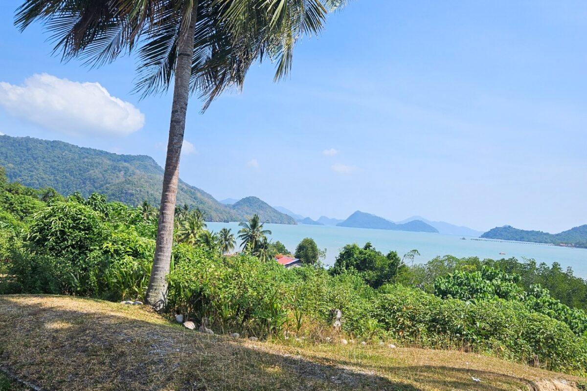 Panoramic coastal view from Pulau Tuba island looking toward the Langkawi archipelago
