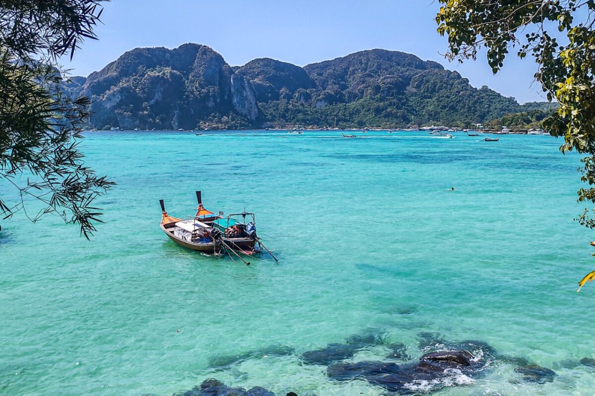 Viking Beach Koh Phi Phi with clear turquoise water and longtail boat
