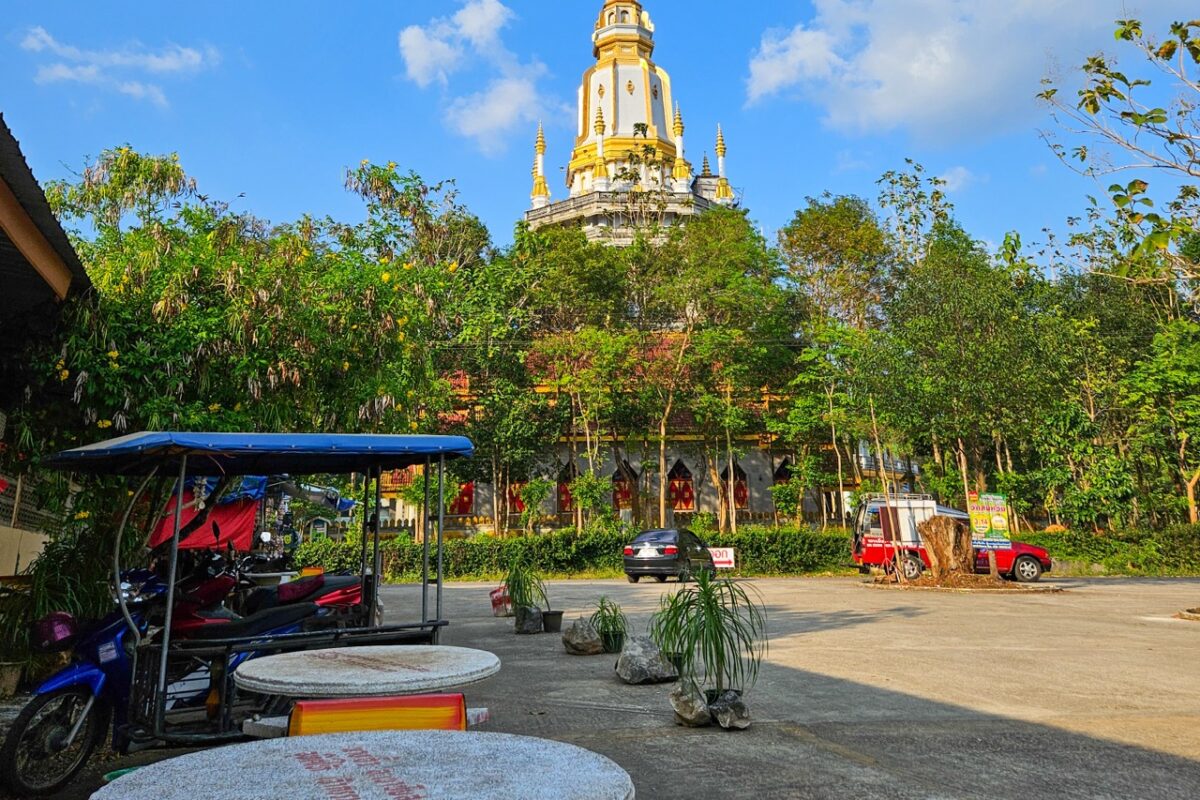 Wat Tham Suea Tiger Cave Temple in Krabi surrounded by tropical trees in southern Thailand