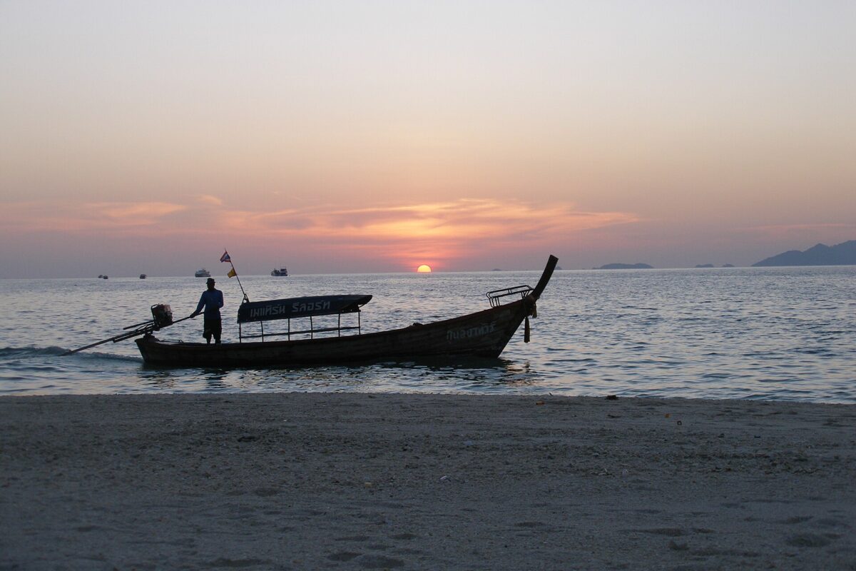 Sunset beach Koh Lipe Thailand with boats and ocean view