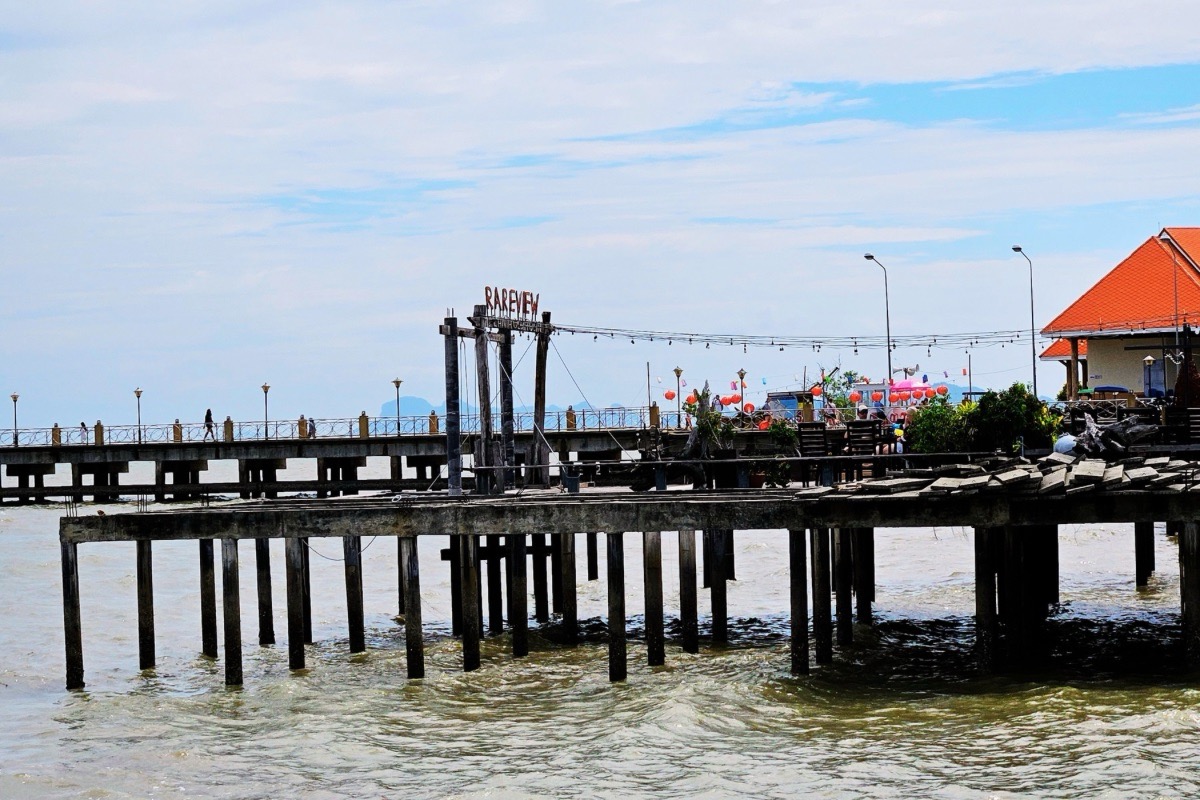 Wooden waterfront pier and restaurant in Koh Lanta Old Town