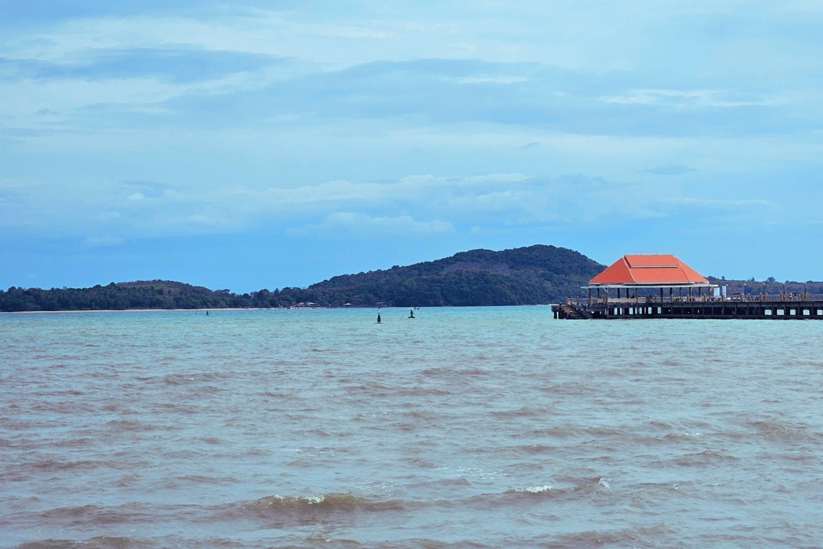 Koh Lanta Old Town pier overlooking the sea and Koh Por forested coastline